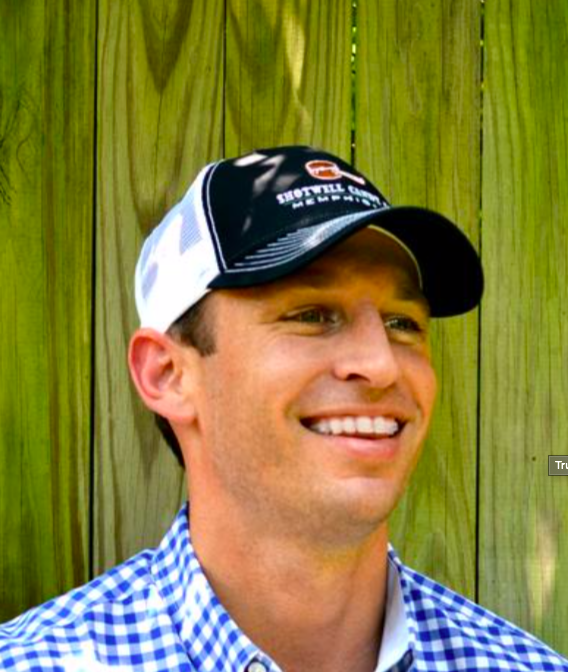 Person wearing Shotwell Candy logo hat